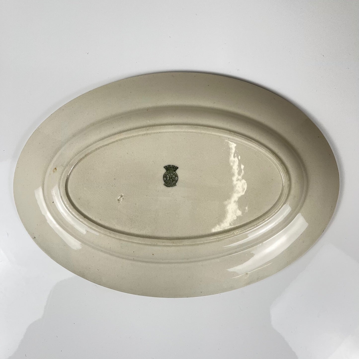 Oval dish, "Champagne" model, Badonviller, green