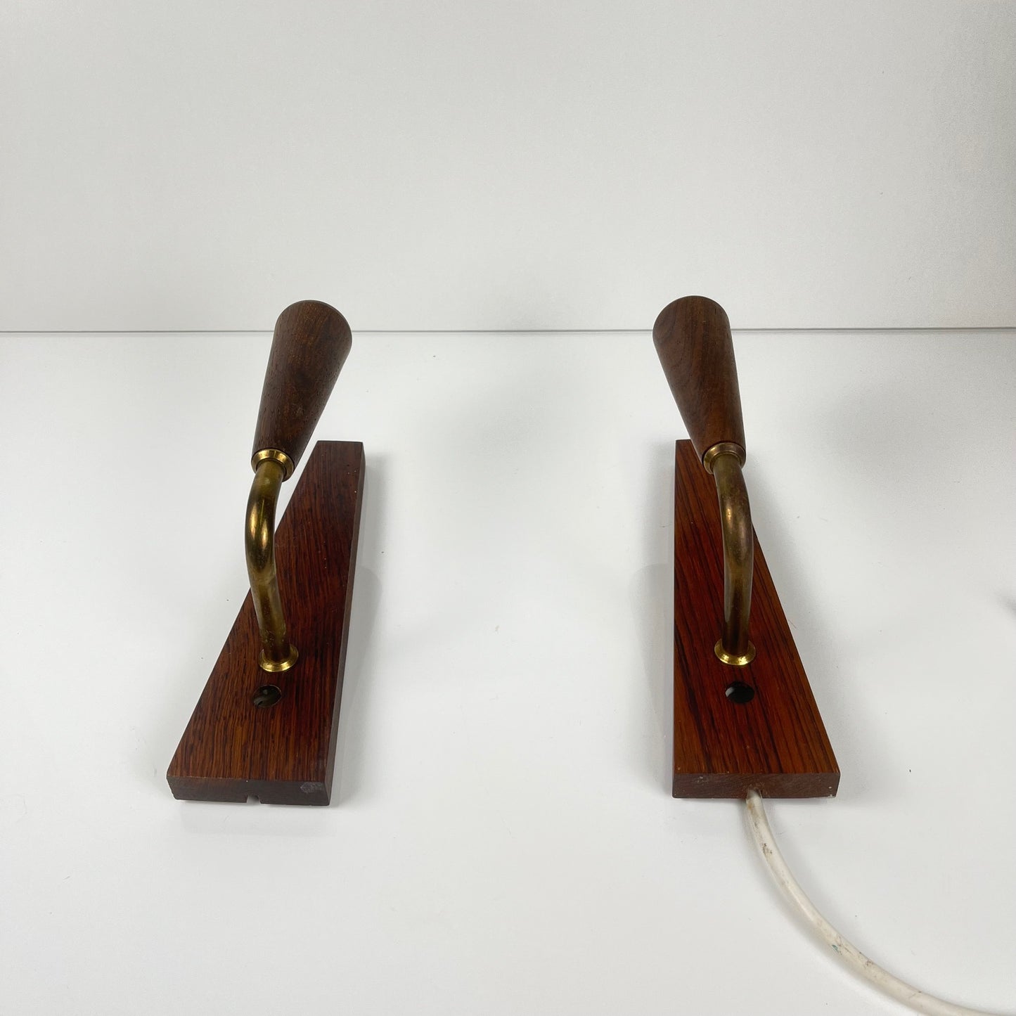 Pair of Danish rosewood wall sconces, 1960/70