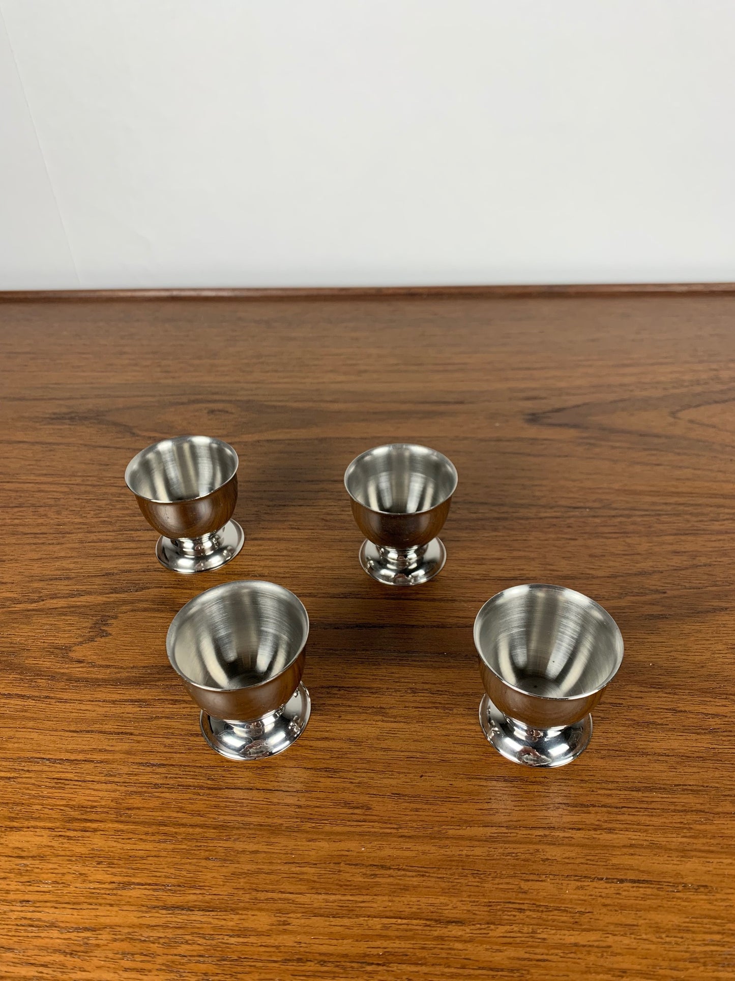 Set of 4 stainless steel egg cups, 1970