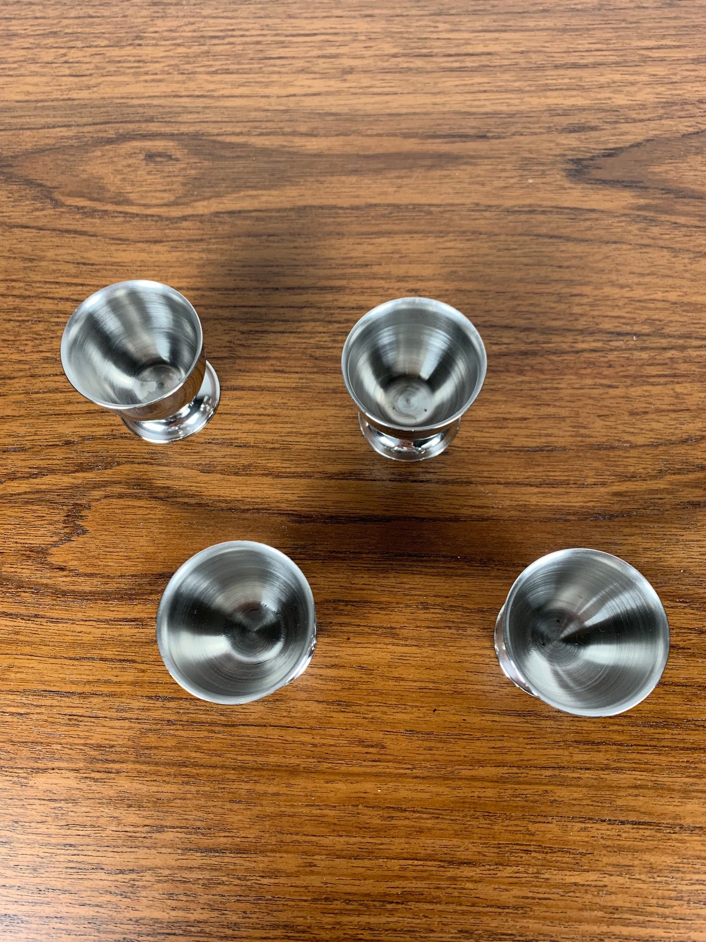 Set of 4 stainless steel egg cups, 1970