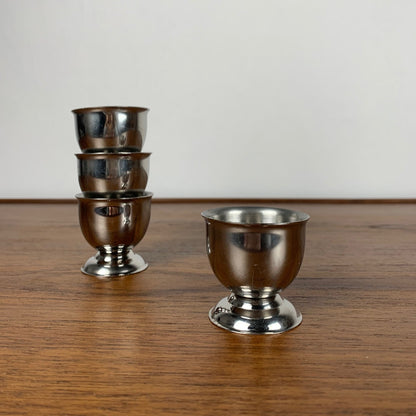 Set of 4 stainless steel egg cups, 1970