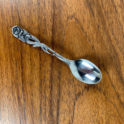 Antique silver metal dessert spoons and forks, flower motif