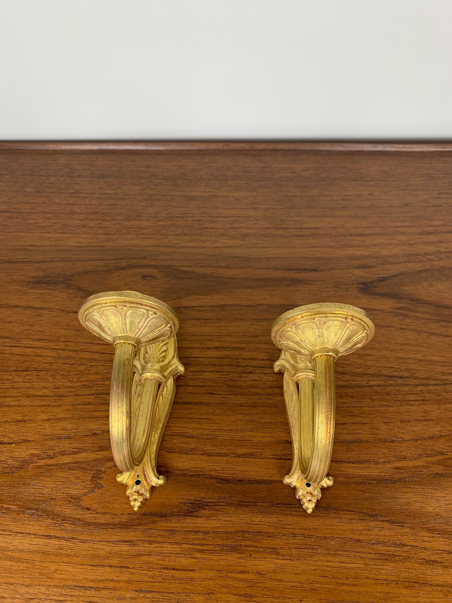 Pair of brass candle wall sconces, neoclassical style