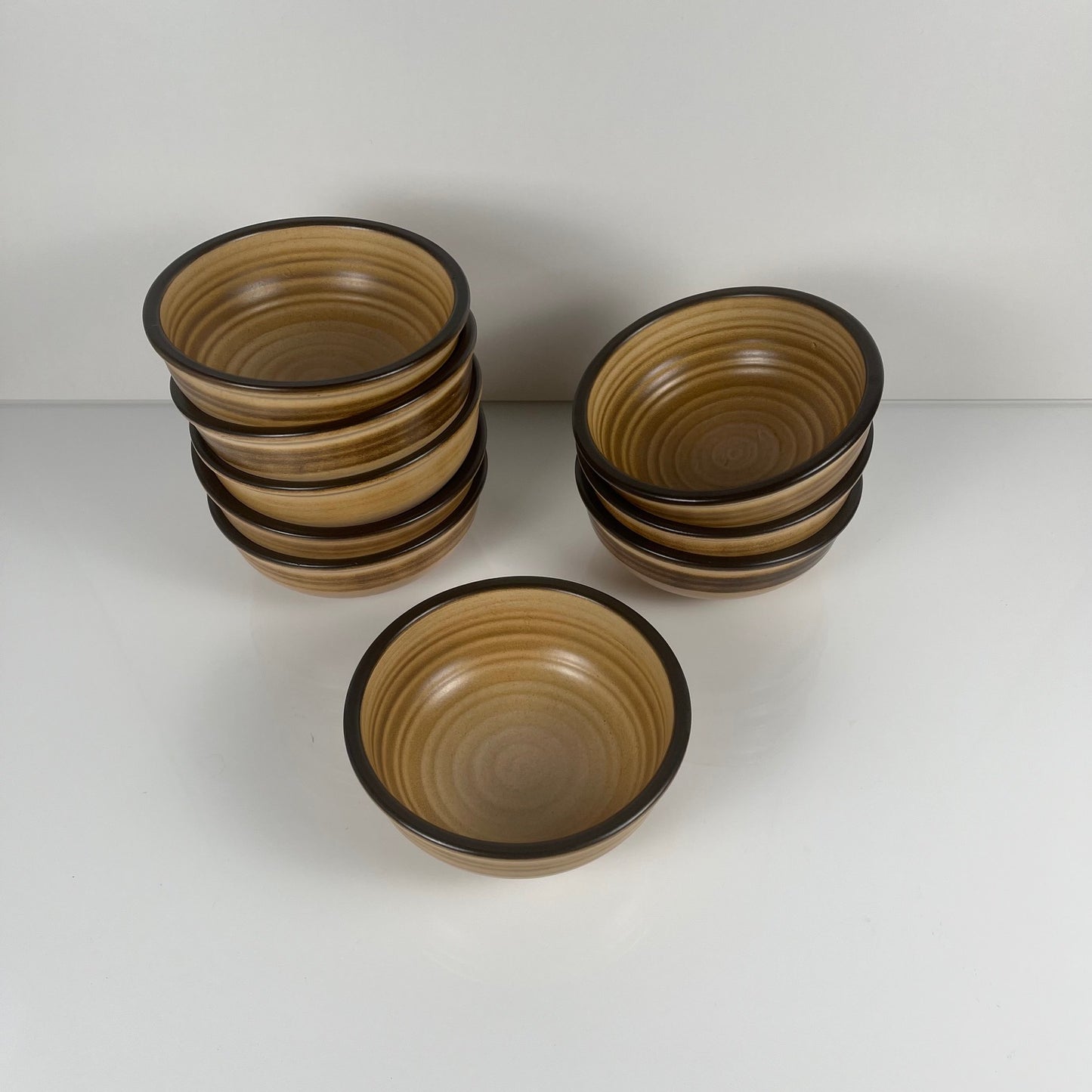 Set of 9 Salins stoneware bowls, brown tones