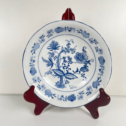 4 bowls/cups with blue onion pattern