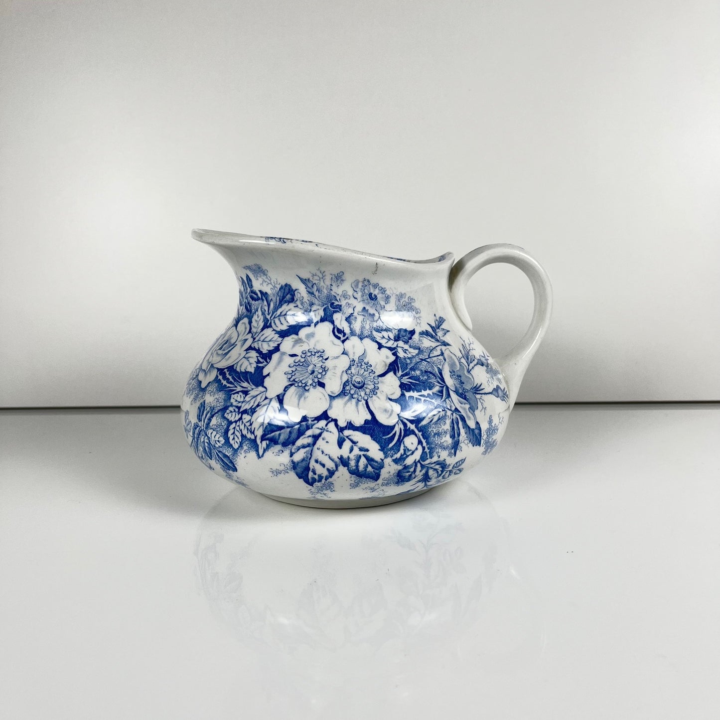Chubby pitcher, antique KG Lunéville wash jug, blue with floral pattern, late 19th - early 20th century