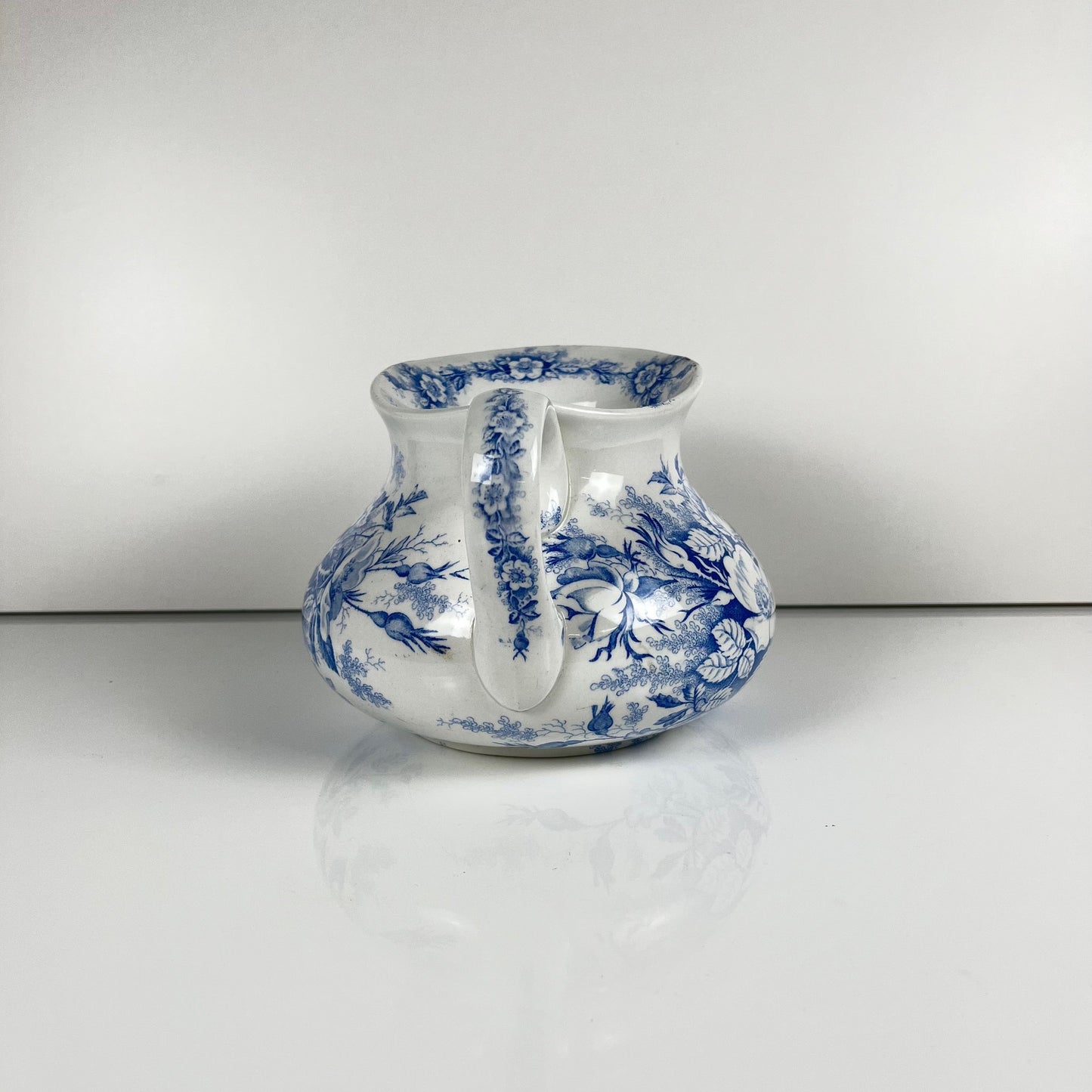 Chubby pitcher, antique KG Lunéville wash jug, blue with floral pattern, late 19th - early 20th century
