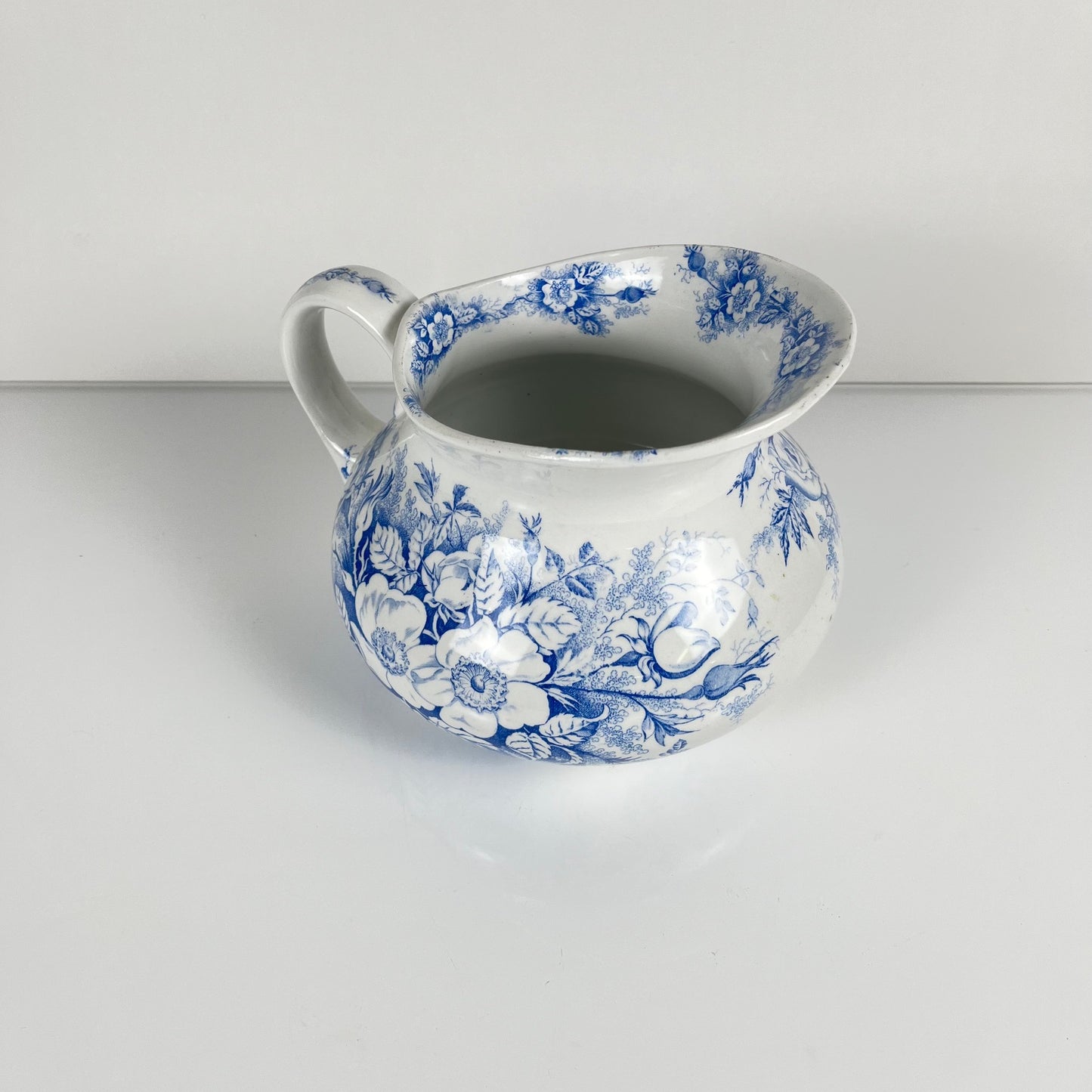 Chubby pitcher, antique KG Lunéville wash jug, blue with floral pattern, late 19th - early 20th century