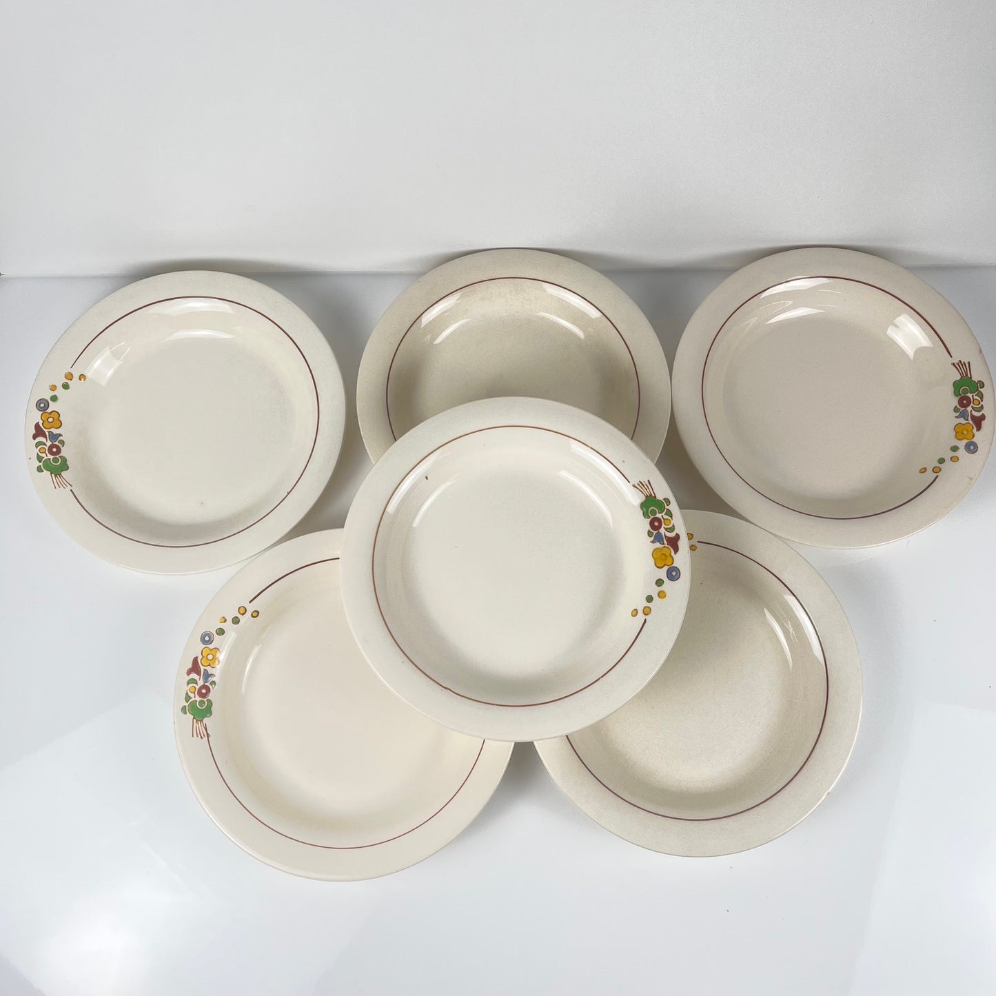 Set de 6 assiettes demi-creuse Longwy , début XXème s. , décor Floral