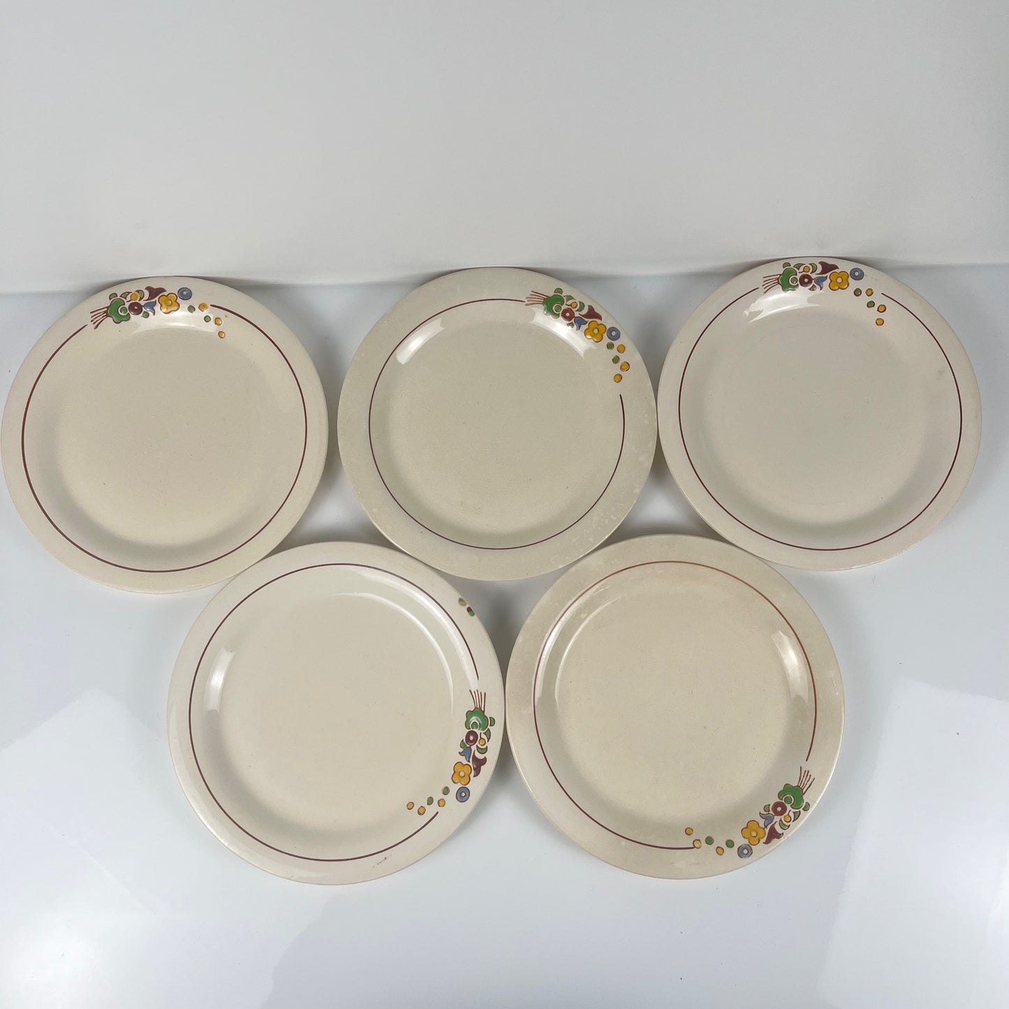 Set de 5 assiettes à dessert Longwy , début XXème s. , décor Floral