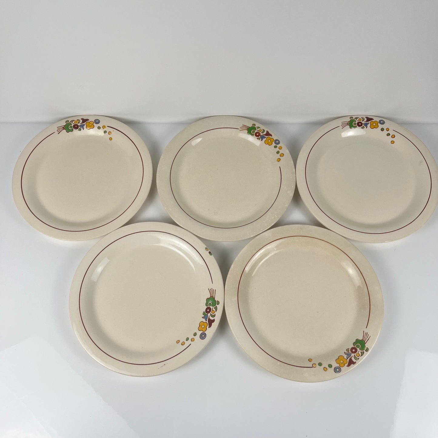 Set de 5 assiettes à dessert Longwy , début XXème s. , décor Floral