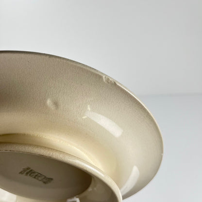 Assiette de présentation piédouche Longwy , début XXème s. , décor Floral