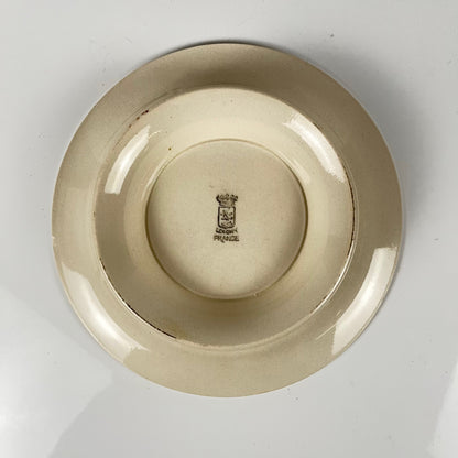 Assiette de présentation piédouche Longwy , début XXème s. , décor Floral