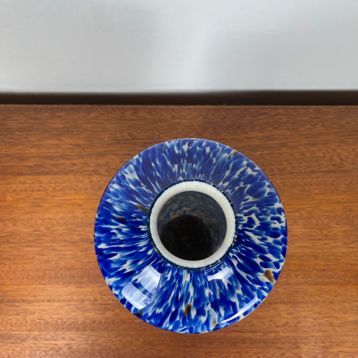 Blown glass vase with cobalt blue and white speckled effect