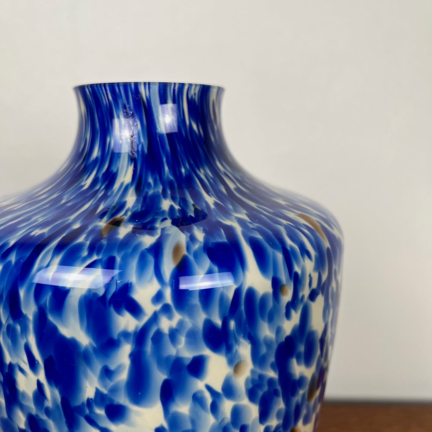 Blown glass vase with cobalt blue and white speckled effect