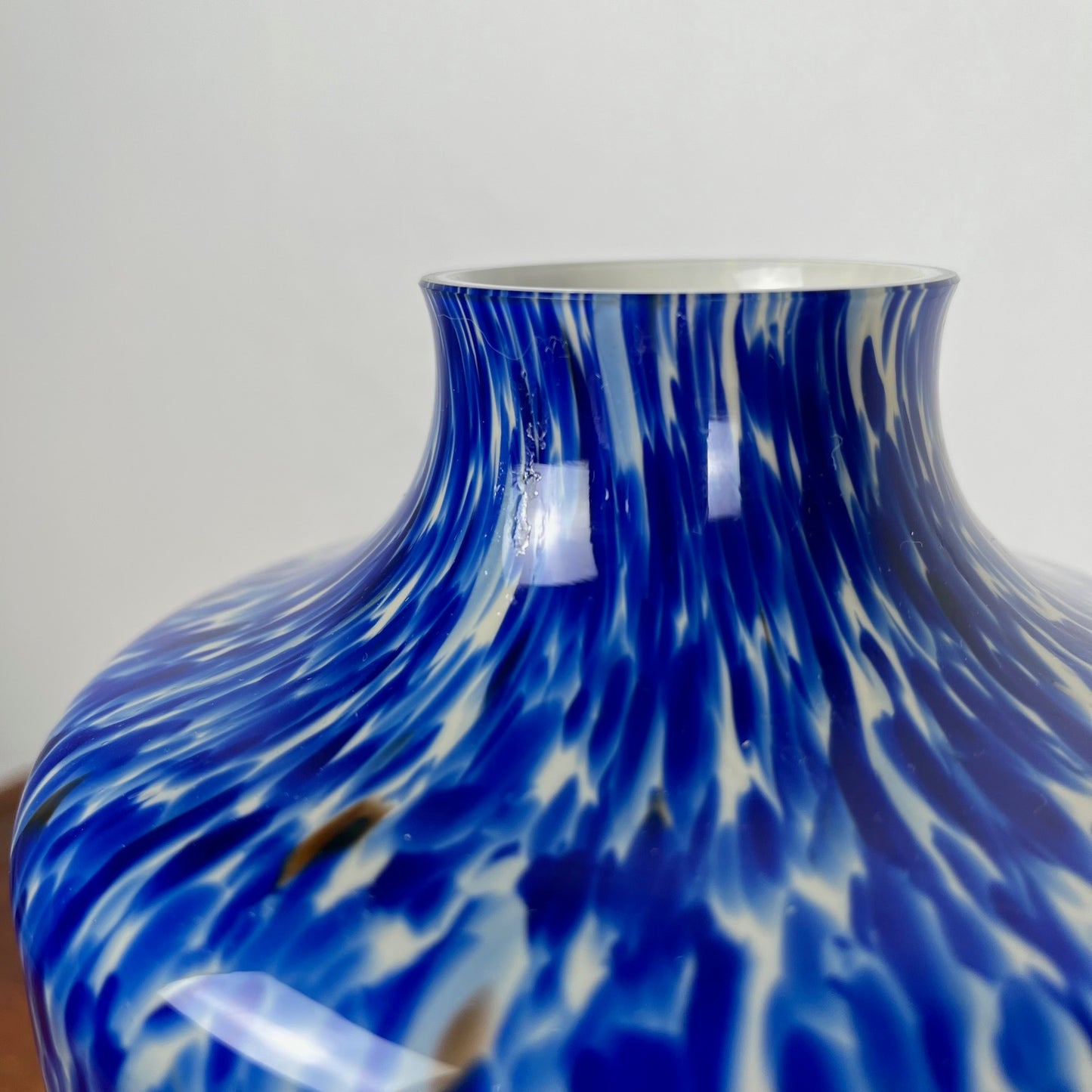 Blown glass vase with cobalt blue and white speckled effect