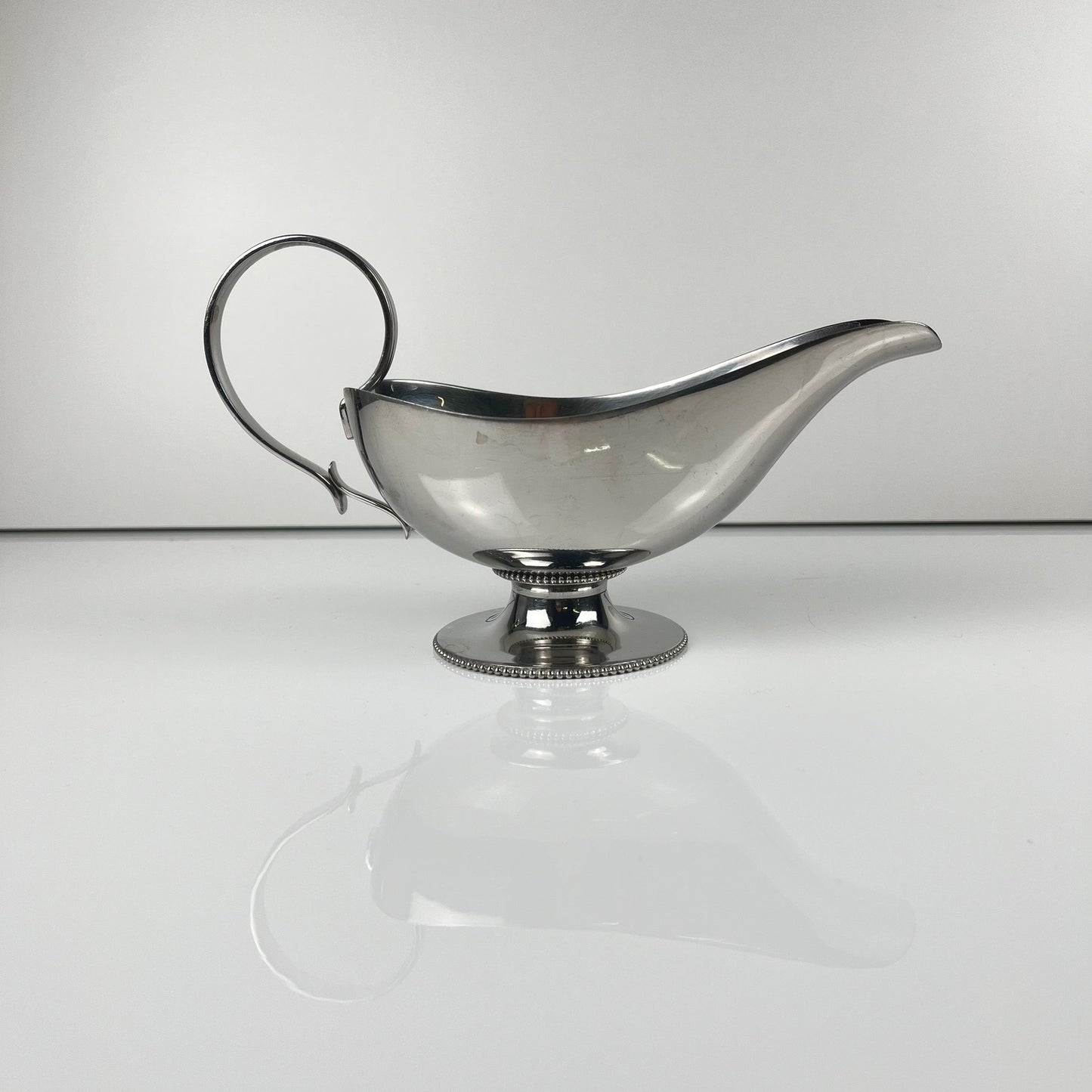 Royal BB stainless steel gravy boat, France, mid-20th century.