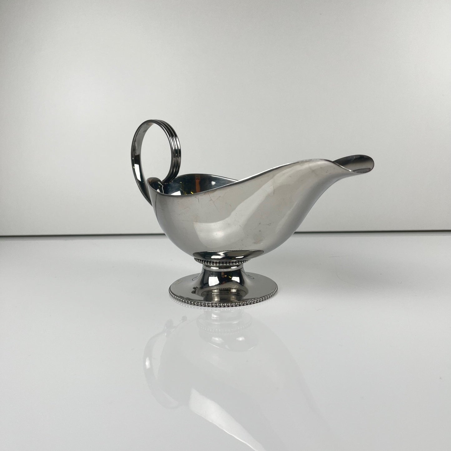 Royal BB stainless steel gravy boat, France, mid-20th century.