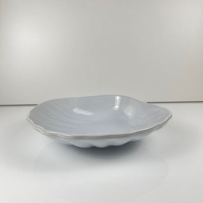Large platter in the shape of a scallop shell, Emile Henry, France, mid-20th century
