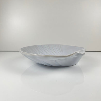 Large platter in the shape of a scallop shell, Emile Henry, France, mid-20th century