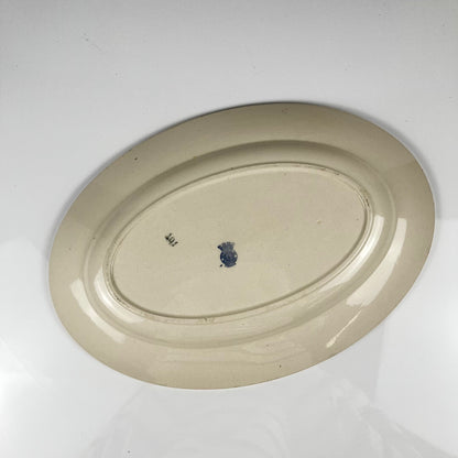 Plat ovale Demi-porcelaine Badonviller, motif fleurs bleu, début XXe