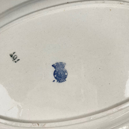 Plat ovale Demi-porcelaine Badonviller, motif fleurs bleu, début XXe