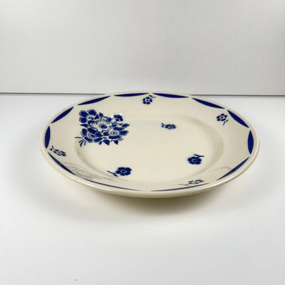 Plat à gateau Demi-porcelaine Badonviller, motif fleurs bleu, début XXe