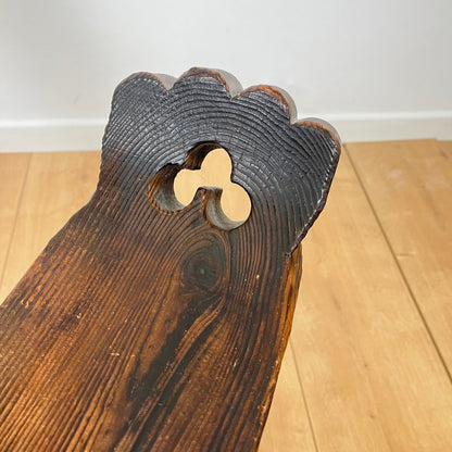 Pair of brutalist tripod low chairs in solid wood, mid-20th century.