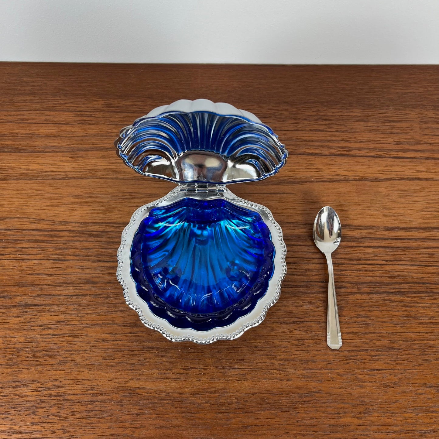 Silver-plated metal shell butter dish with blue insert, 1970