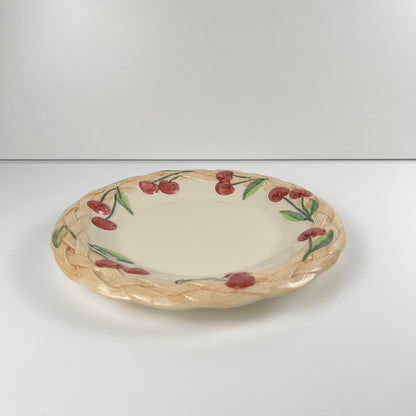 Antique earthenware dish with cherry pattern, signed "FG", 20th century