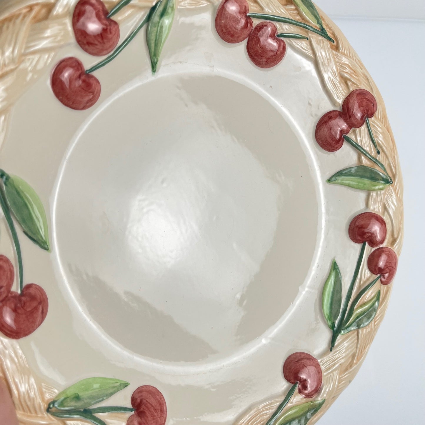 Antique earthenware dish with cherry pattern, signed "FG", 20th century