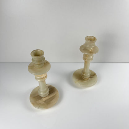 Pair of alabaster candle holders, 20th century