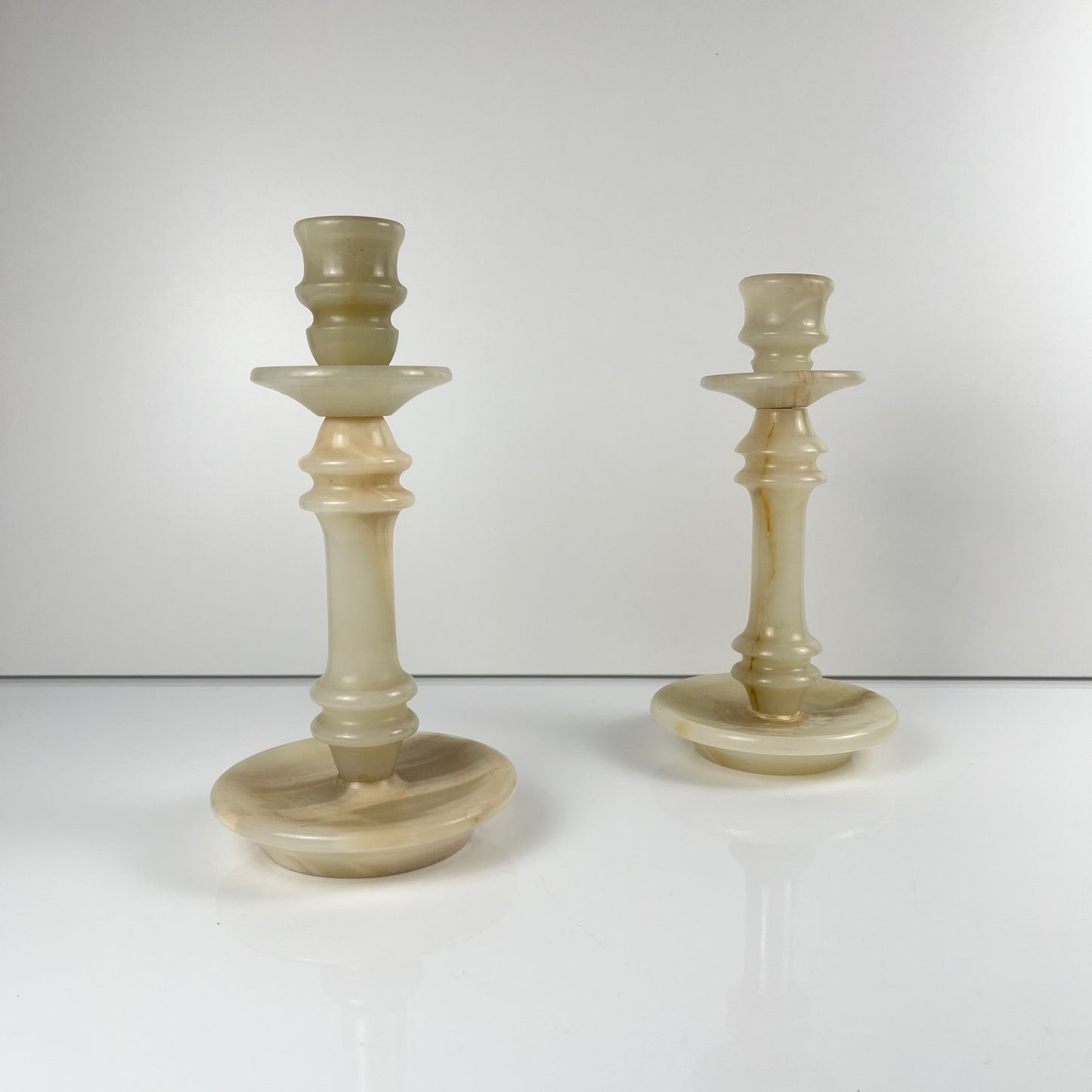 Pair of alabaster candle holders, 20th century