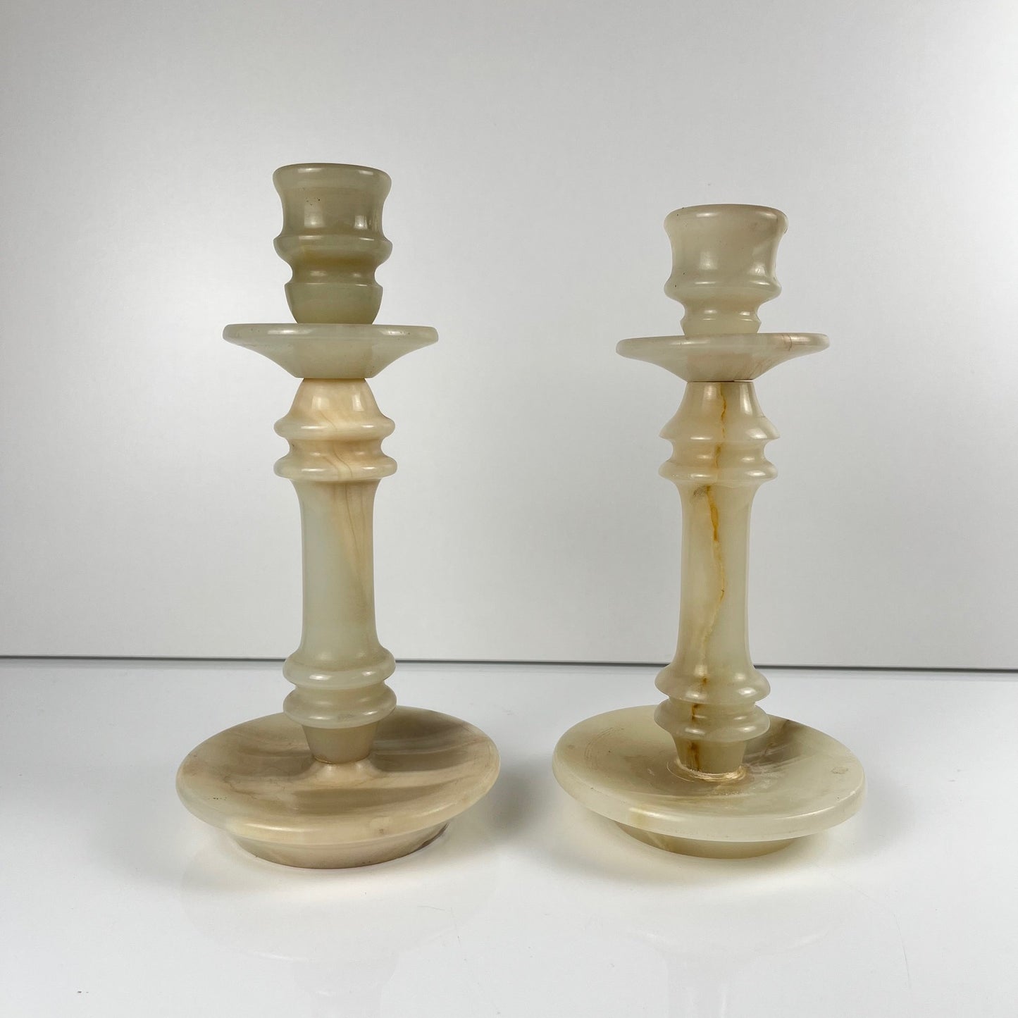 Pair of alabaster candle holders, 20th century