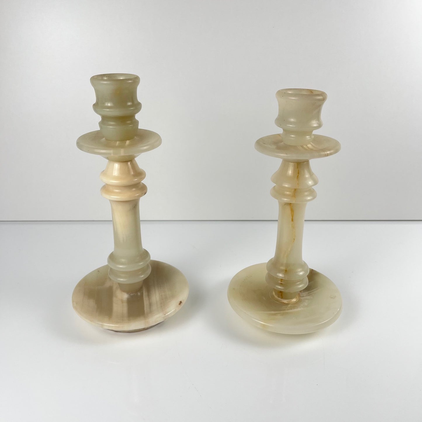 Pair of alabaster candle holders, 20th century