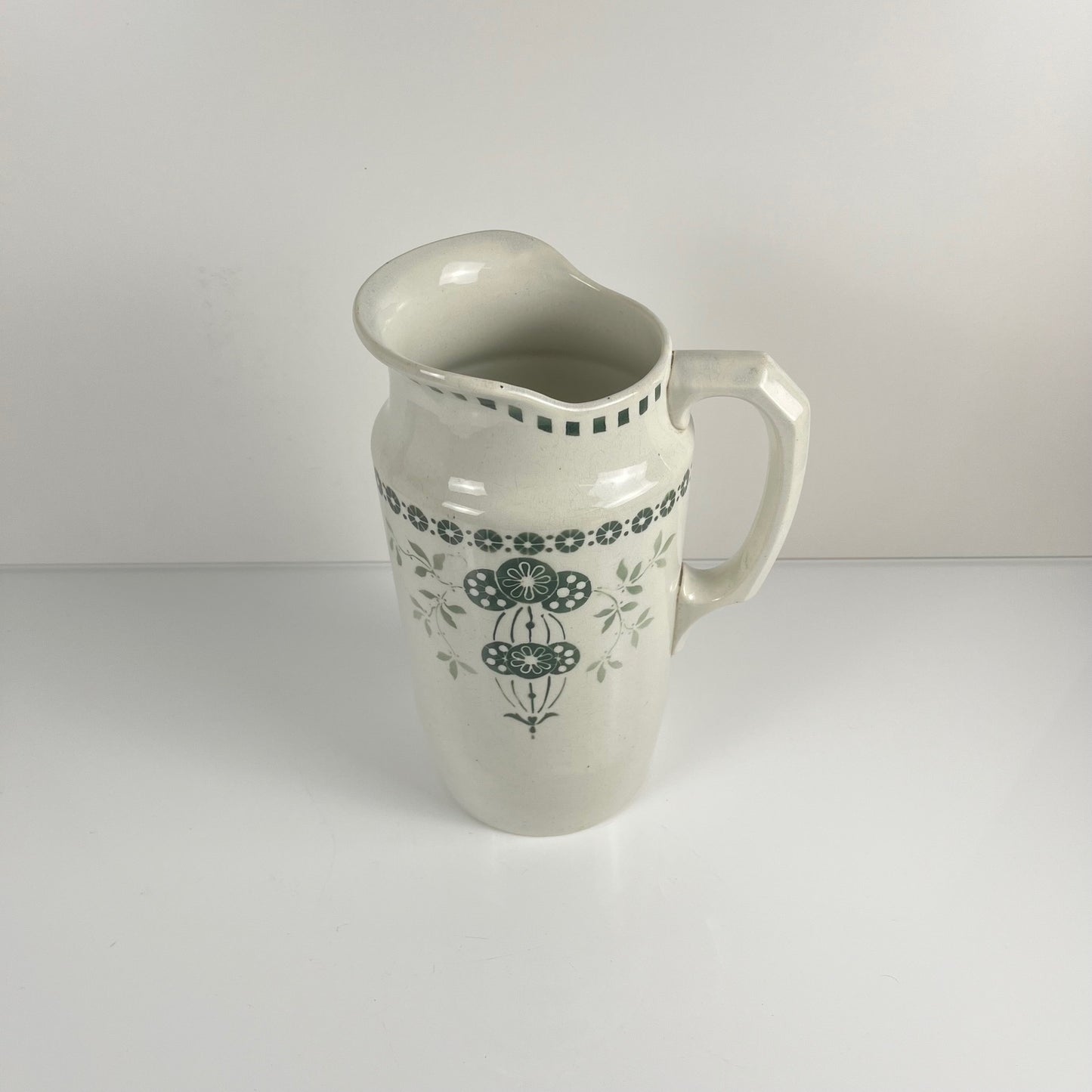 Antique earthenware pitcher, green floral decor, ironstone late 19th - early 20th century