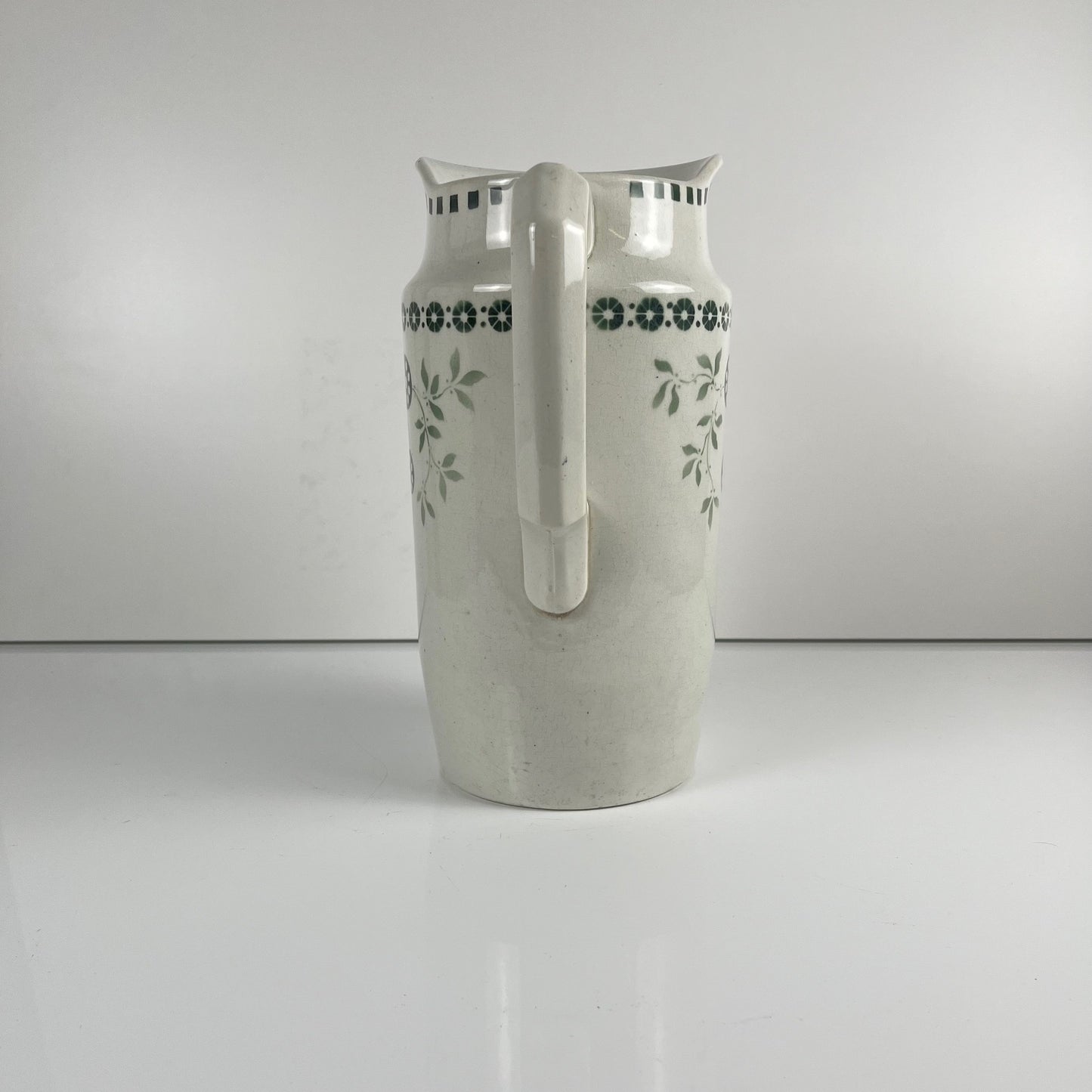 Antique earthenware pitcher, green floral decor, ironstone late 19th - early 20th century