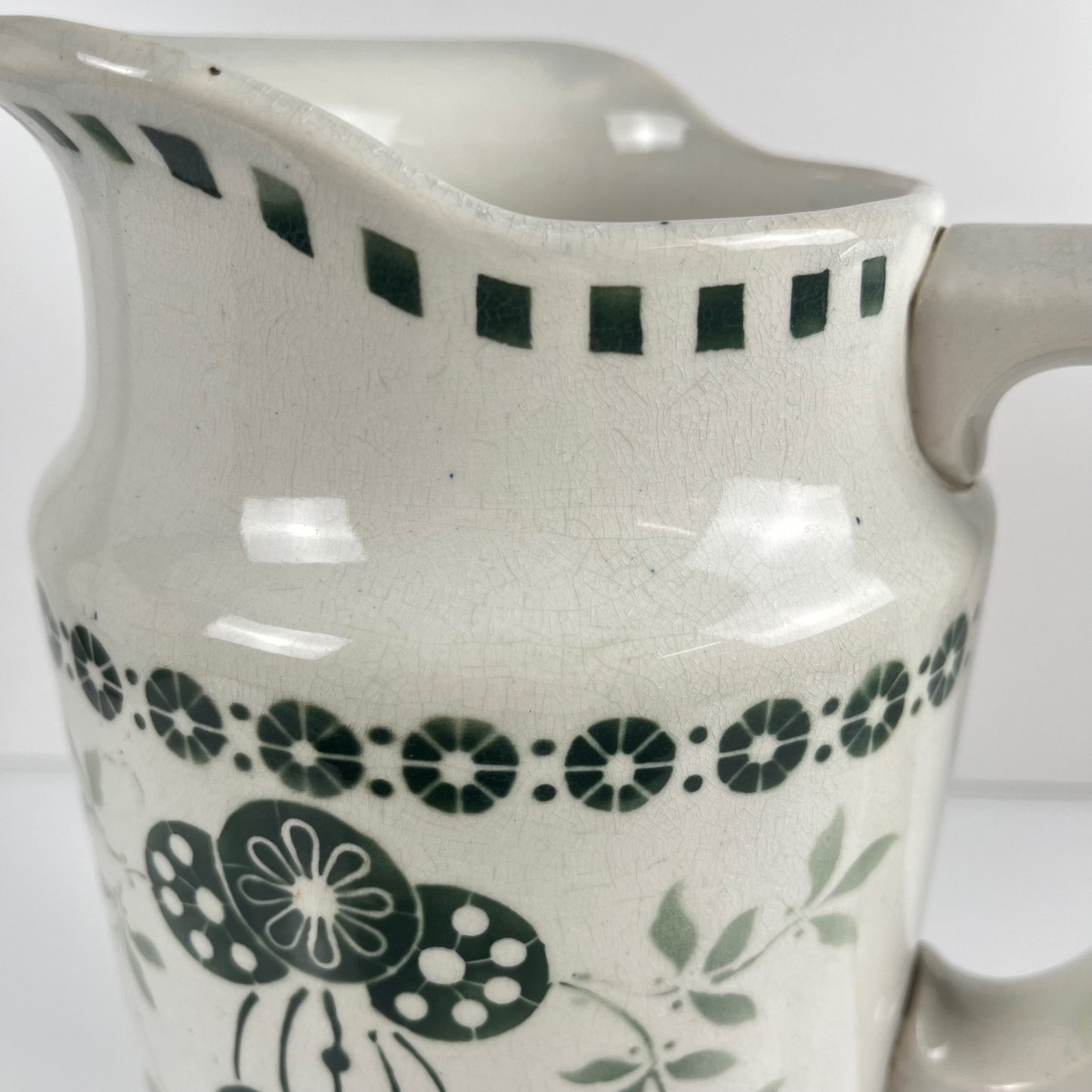 Antique earthenware pitcher, green floral decor, ironstone late 19th - early 20th century