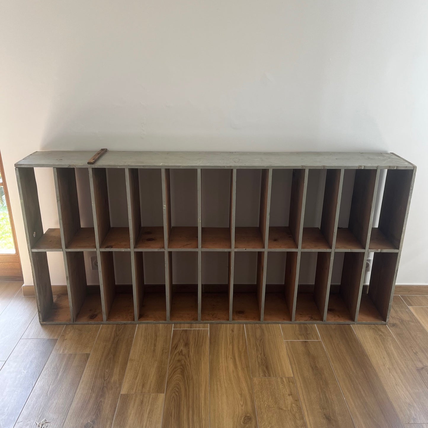 Large antique wood workshop cabinet with compartments, 20th century.

