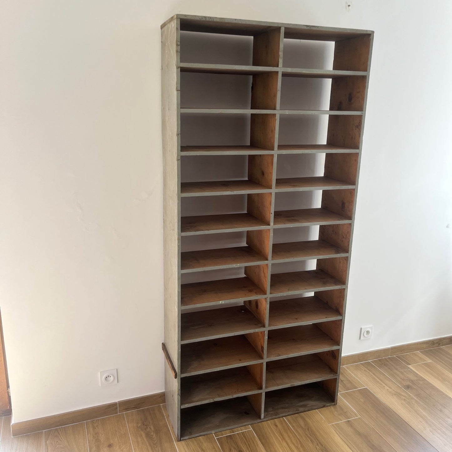 Large antique wood workshop cabinet with compartments, 20th century.

