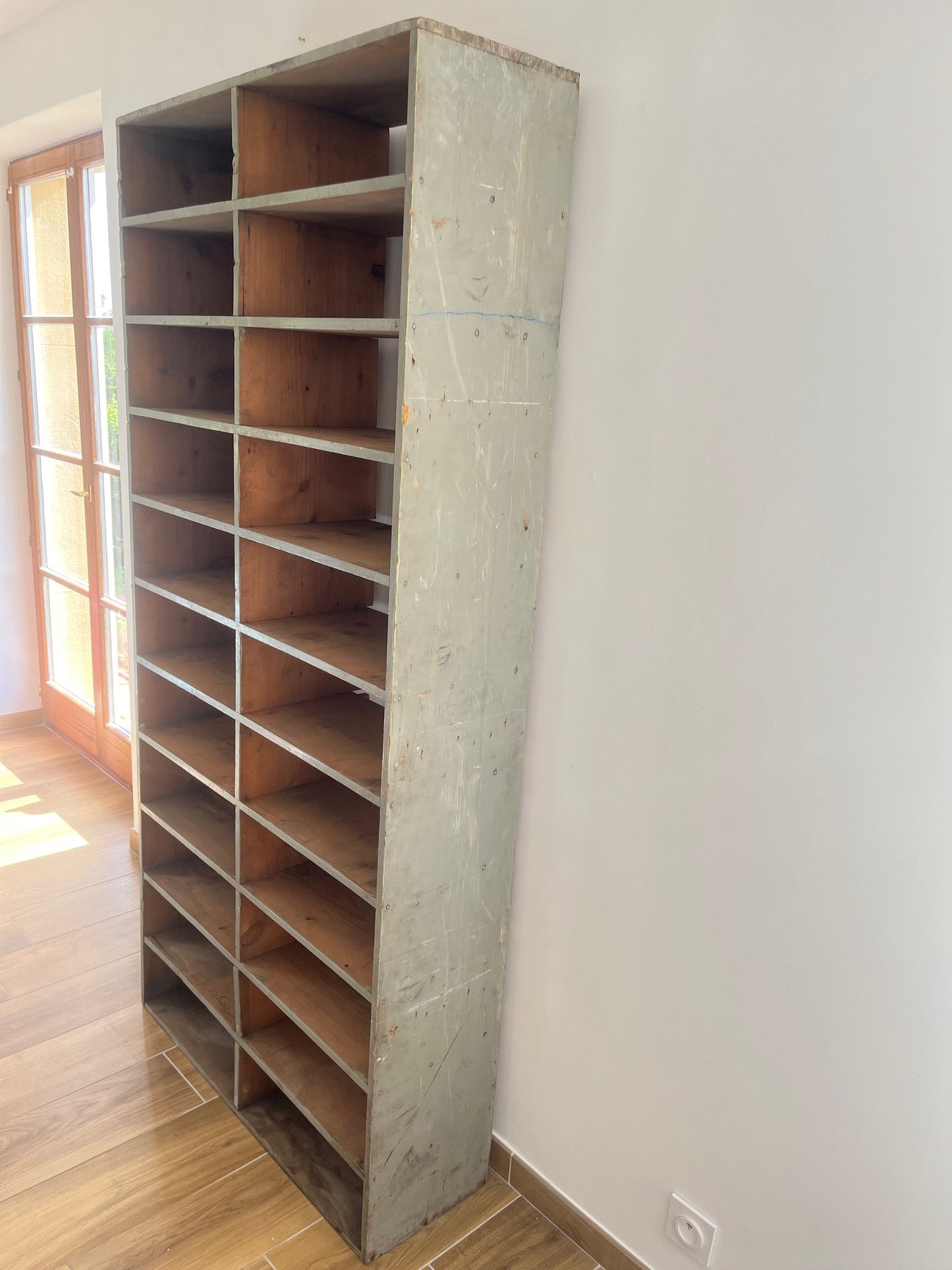 Large antique wood workshop cabinet with compartments, 20th century.
