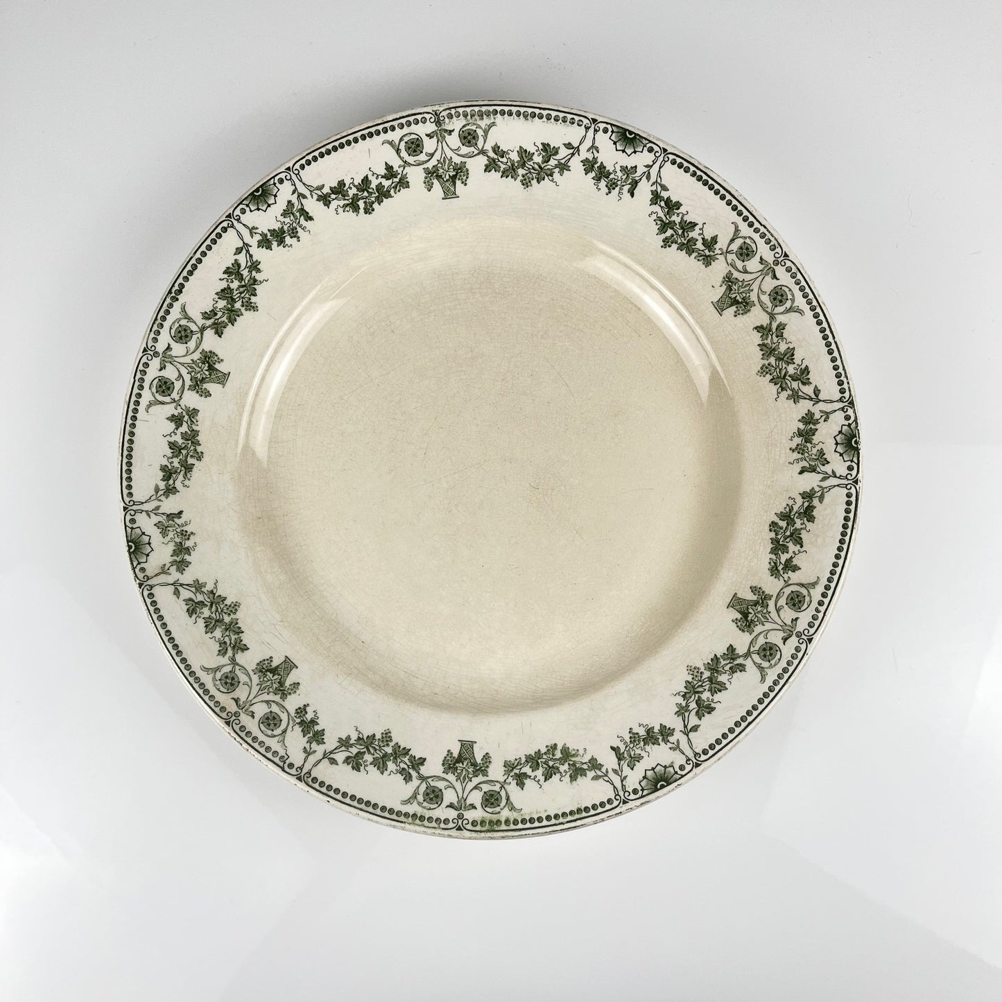 Plat rond "Champagne", Badonviller, vert, début XXème s.