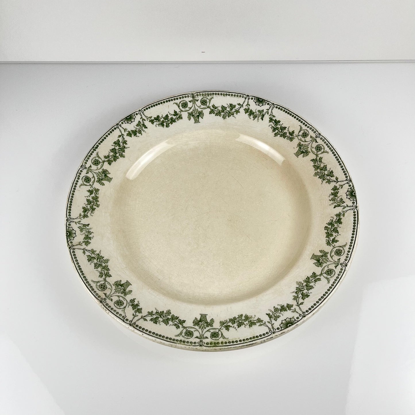 Plat rond "Champagne", Badonviller, vert, début XXème s.