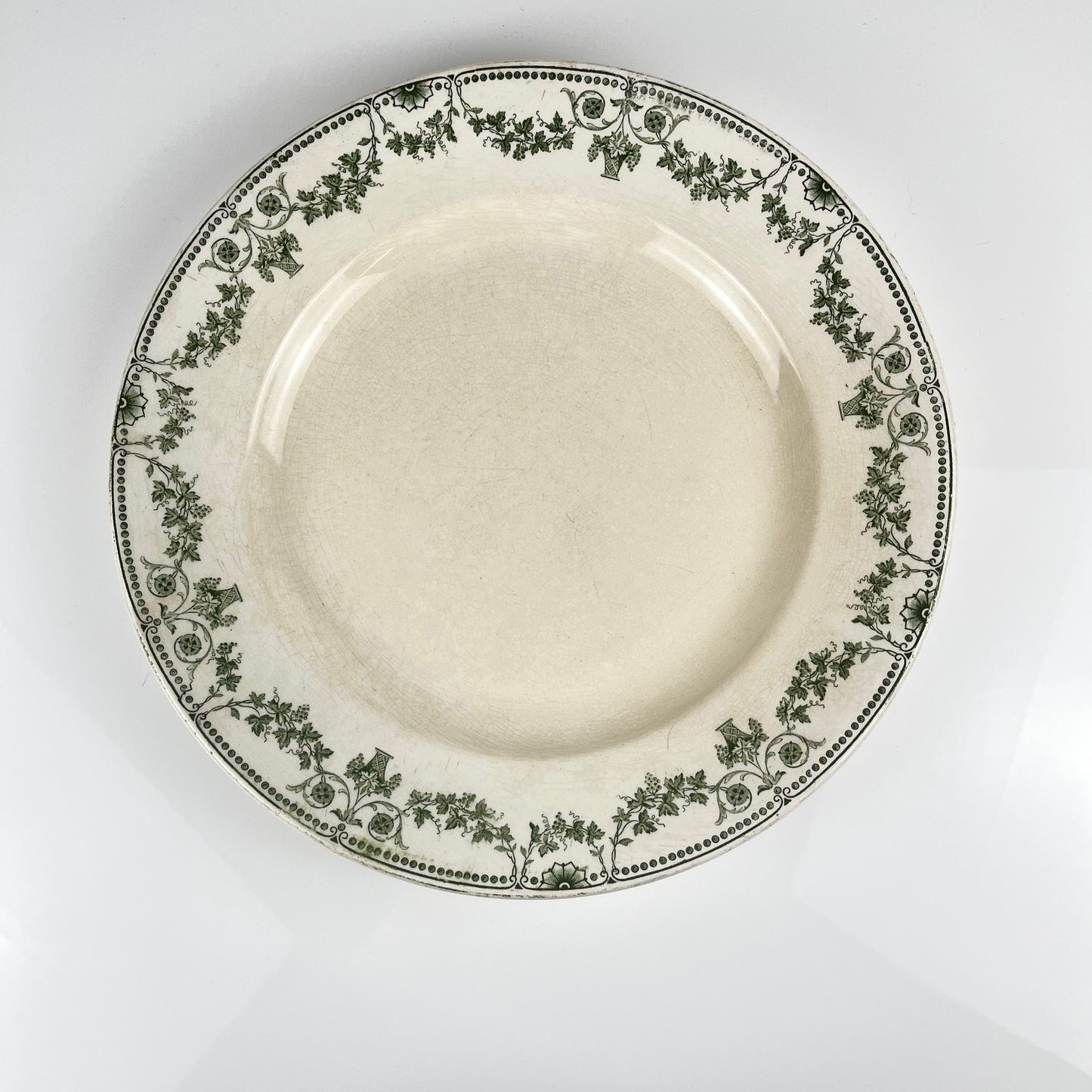 Plat rond "Champagne", Badonviller, vert, début XXème s.