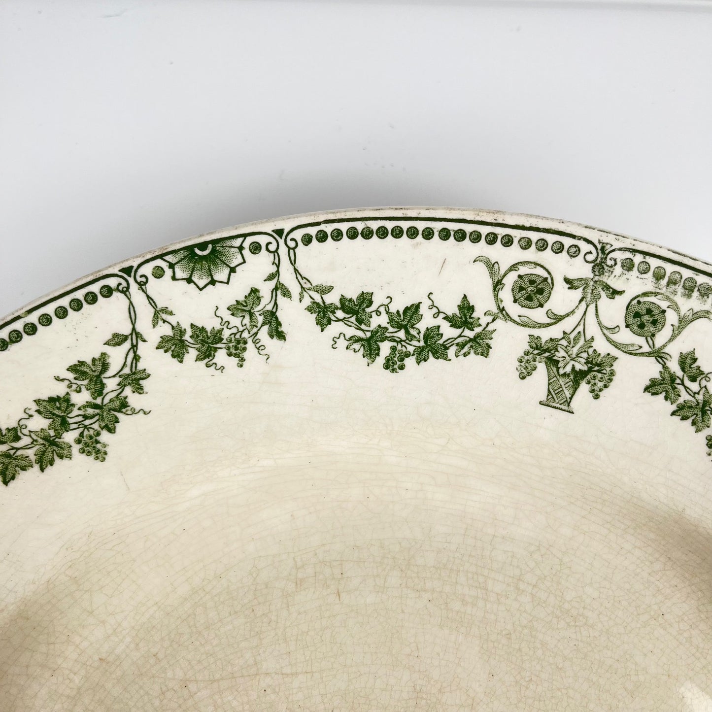 Plat rond "Champagne", Badonviller, vert, début XXème s.