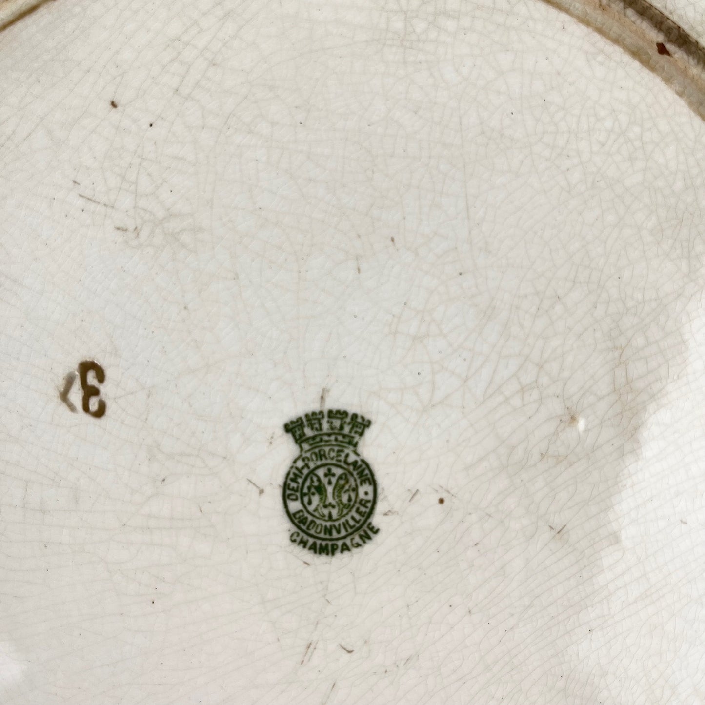 Plat rond "Champagne", Badonviller, vert, début XXème s.