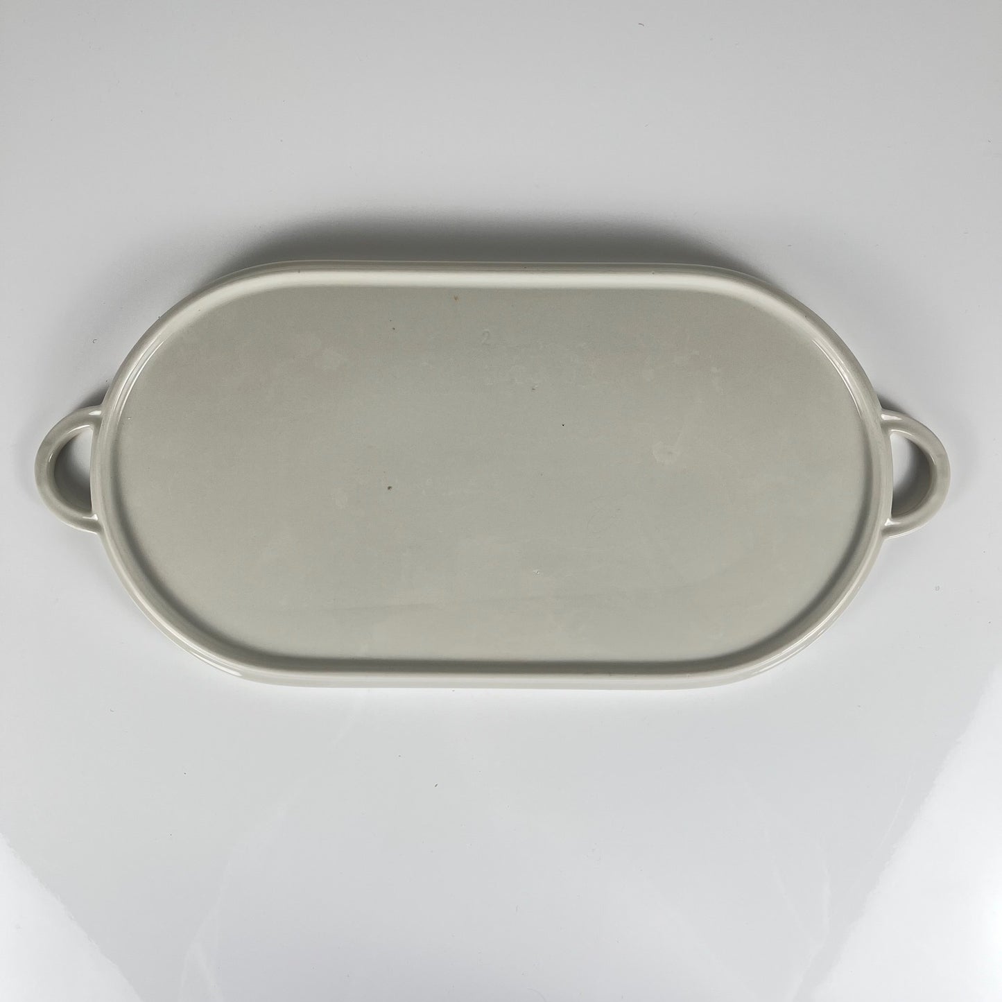 Plat ovale à poignée "Trianon", style Villeroy & Boch