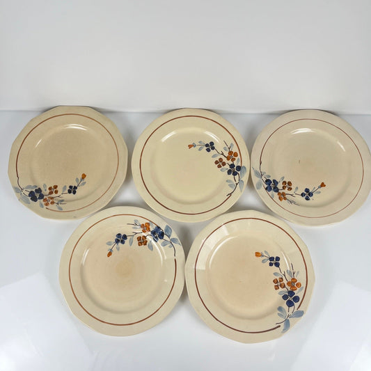 Set de 5 assiettes plates Sarreguemines motif floral, 1920-40