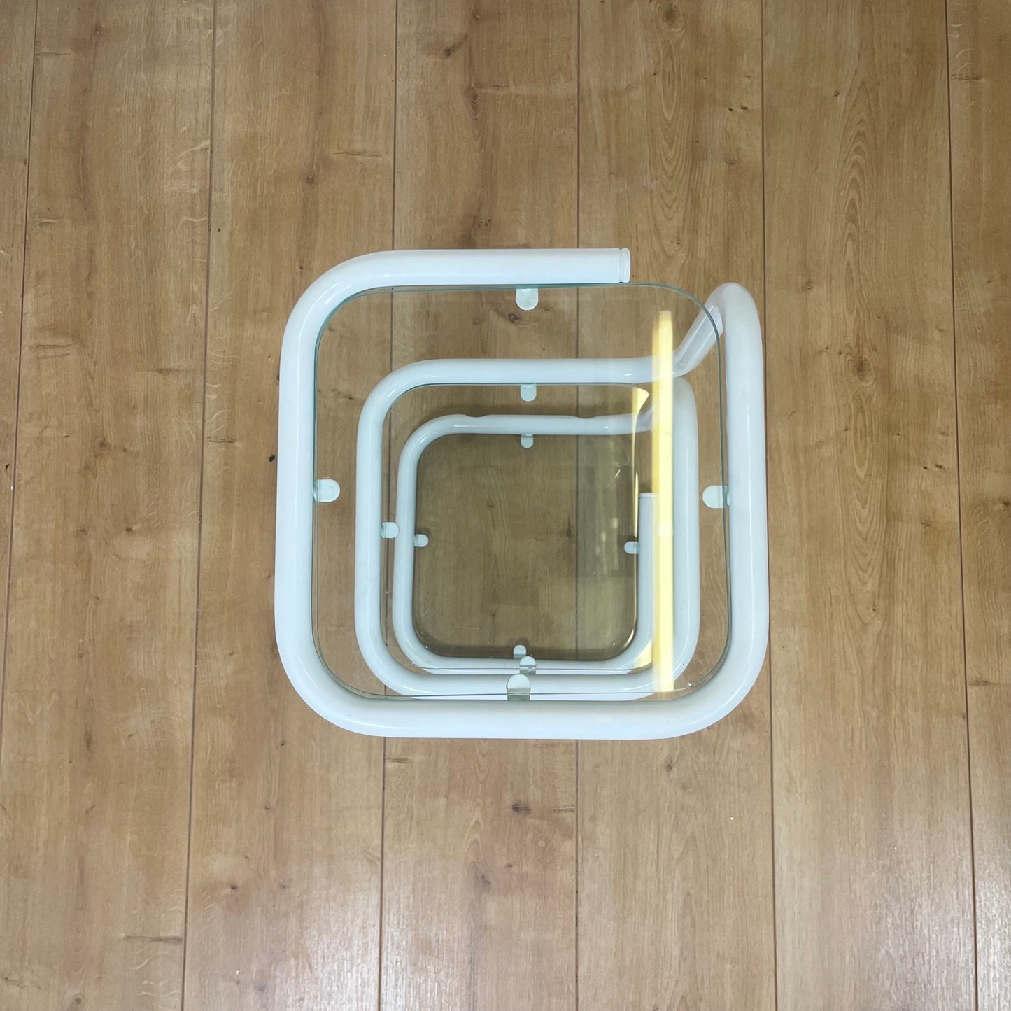 Vintage white tubular metal and glass side table, 1980s modernist design