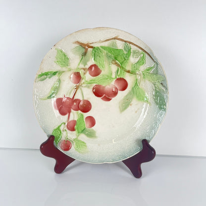 Set of 4 KG St Clément barbotine fruit plates (cherry, mirabelle plum, grape, pear), late 19th-early 20th century